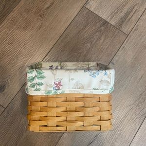 Longaberger basket with floral insert and wooden divider
